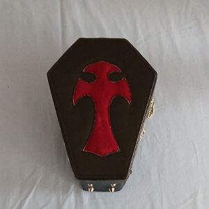 Black Coffin-Shaped Box with Red Cross Design